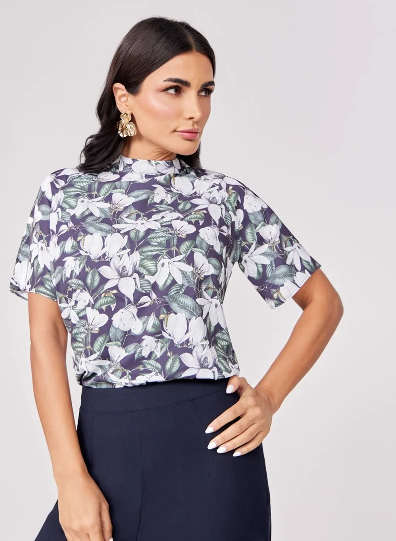 زجزاج بلوزة مطبوعة بأكمام قصيرة باللون الأسود